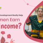 Woman stitching a blouse as part of women skill development training.